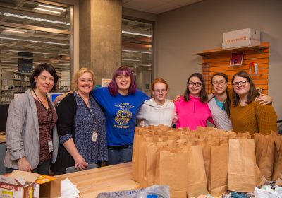 TEENS AT ERIE COUNTY PUBLIC LIBRARY WORKED TOGETHER TO CREATE "BLESSING BAGS" FOR AREA HOMELESS DURING THE WINTER.