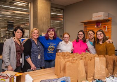 TEENS AT ERIE COUNTY PUBLIC LIBRARY WORKED TOGETHER TO CREATE "BLESSING BAGS" FOR AREA HOMELESS DURING THE WINTER.