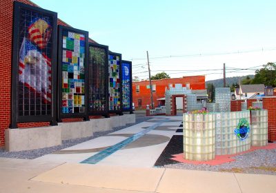a park in Port Allegany features etched glass blocks that showcase the community's history