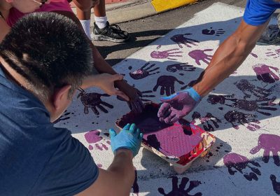 Ambridge residents come together to paint crosswalks in their community. This intro to public art in the town came about through Heart & Soul, and the movement to create more pieces has gained momentum over the years.