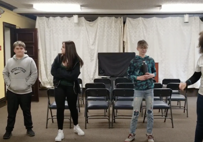 Teens from the Franklin Public Library's Teen Reading Lounge perform their version of an English fable.